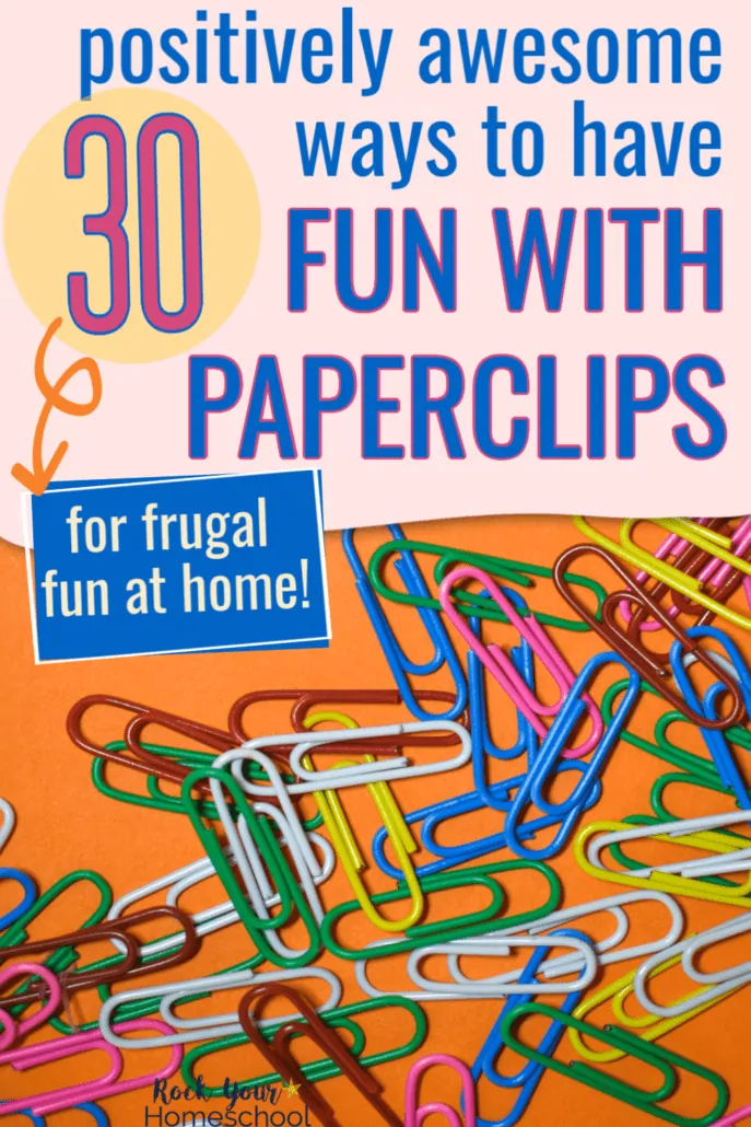 Bunch of colorful paperclips on orange paper to feature the 30 positively amazing ways you can enjoy frugal fun at home with kids using paperclips