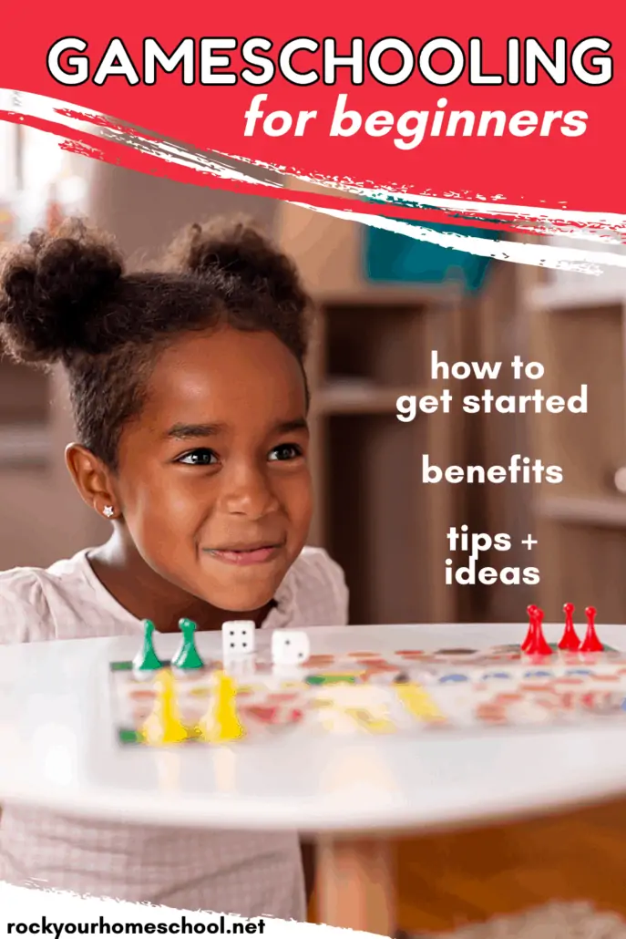 Young girl smiling as she plays a board game to feature how you can use this gameschooling 101 guide to learn more about this fun homeschool approach, its benefits, tips and ideas, and more