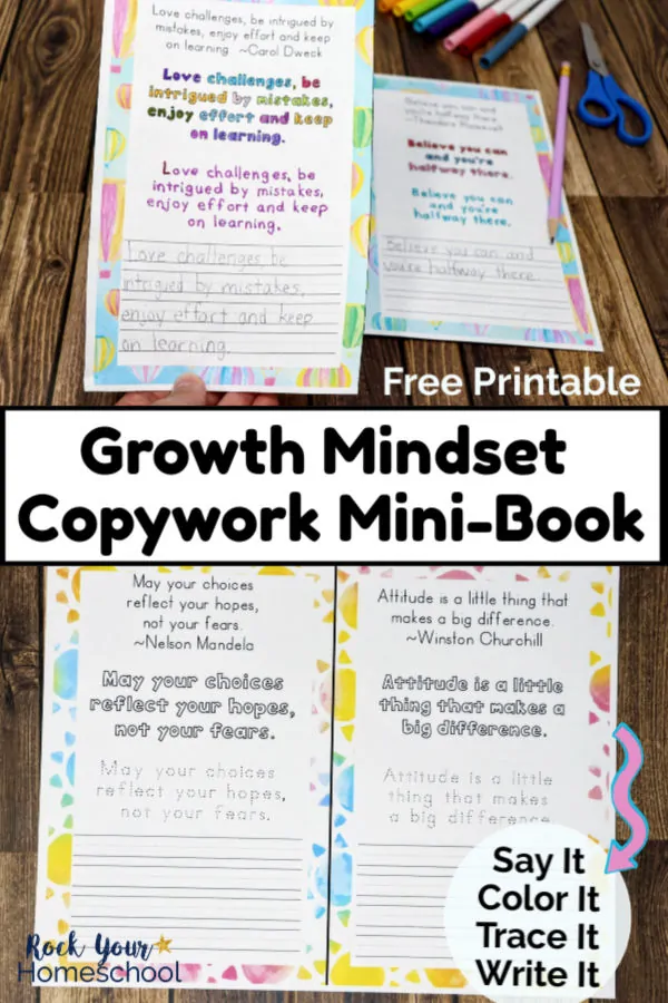 Woman holding growth mindset copywork mini-book page with wood background and more copywork pages with watercolor rainbow suns on wood background