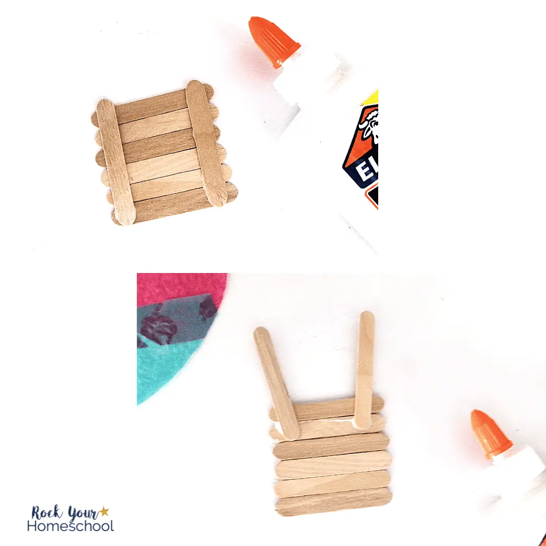 step 2 of hot air balloon tissue paper craft with wood popsicle sticks and glue