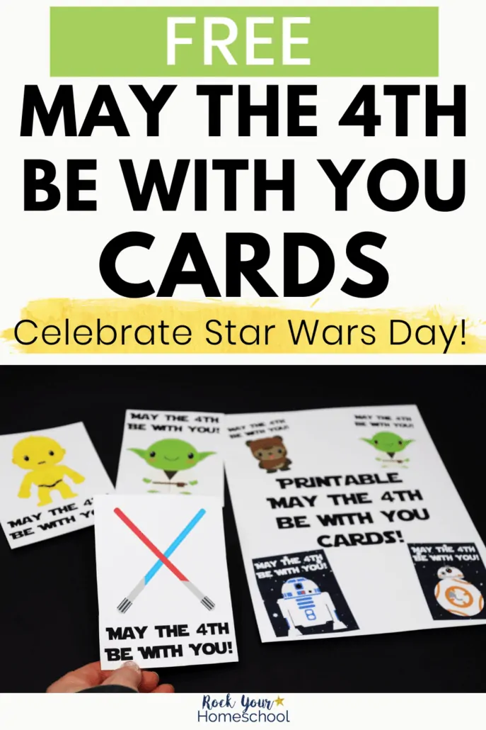 Woman holding May the 4th Be With You card with red & blue light sabers and other printable cards featuring C-3PO, Yoda, Ewok, R2-D2-, BB-8 to highlight the easy fun you can have with these free printable cards to celebrate Star Wars Day